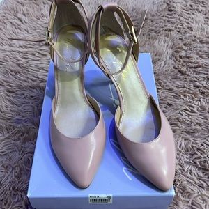 Marc Fisher along back pointed toe heels in medium pink. Size 8.